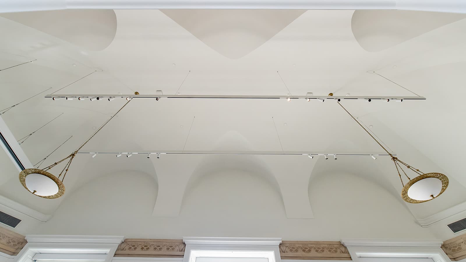 Ceiling photo of light fixtures with gold wall borders